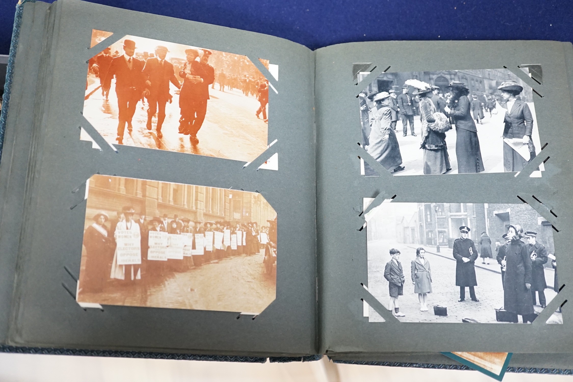 Three postcard albums including postcards related to London, London during the war, naval scenes, ships, Pompeii, Vesuvius, Egypt etc.